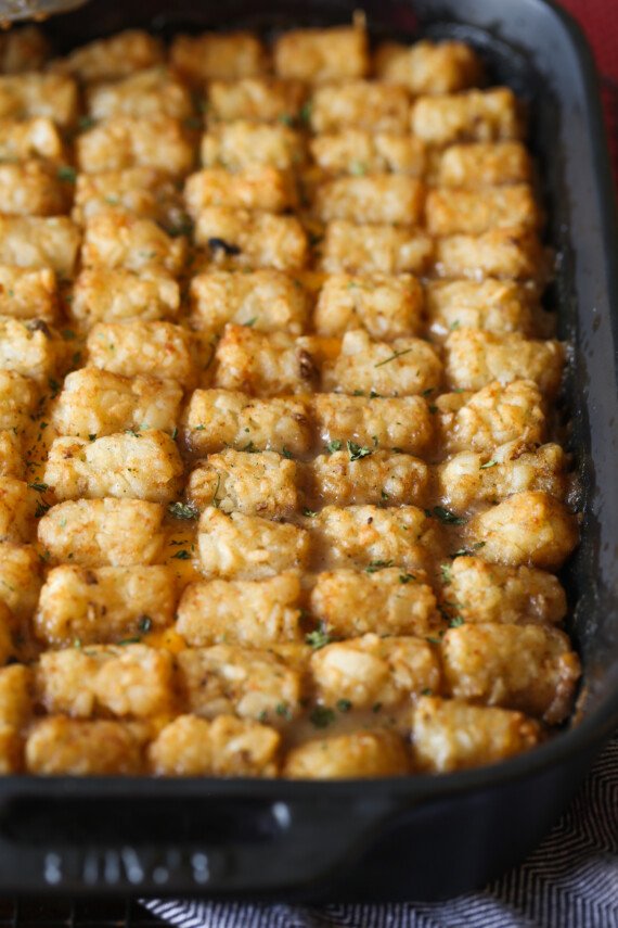 Tater tot casserole in a 9x13 pan.