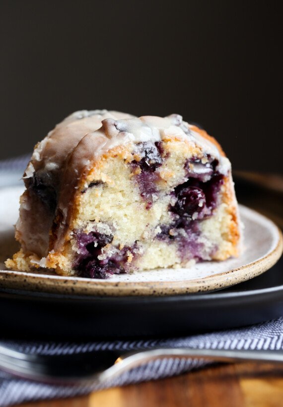 A slice of Blueberry Bundt Cake on a plate