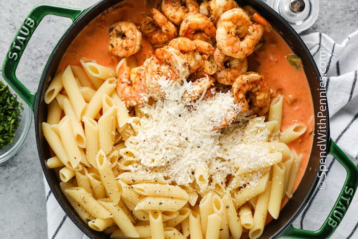 Cajun Shrimp Pasta is a great one-pot pasta dish that's perfect when something different is called for. Creamy and spicy Cajun-style sauce makes this dish perfect for serving with a slice of crusty bread. #spendwithpennies #cajunshrimppasta #entree #recipe #spicy #easy #withsausage #creamy #best #withpeppers #easyonepot