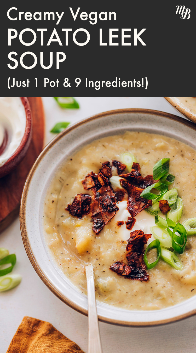 Bowl of creamy vegan potato soup topped with coconut bacon and green onion